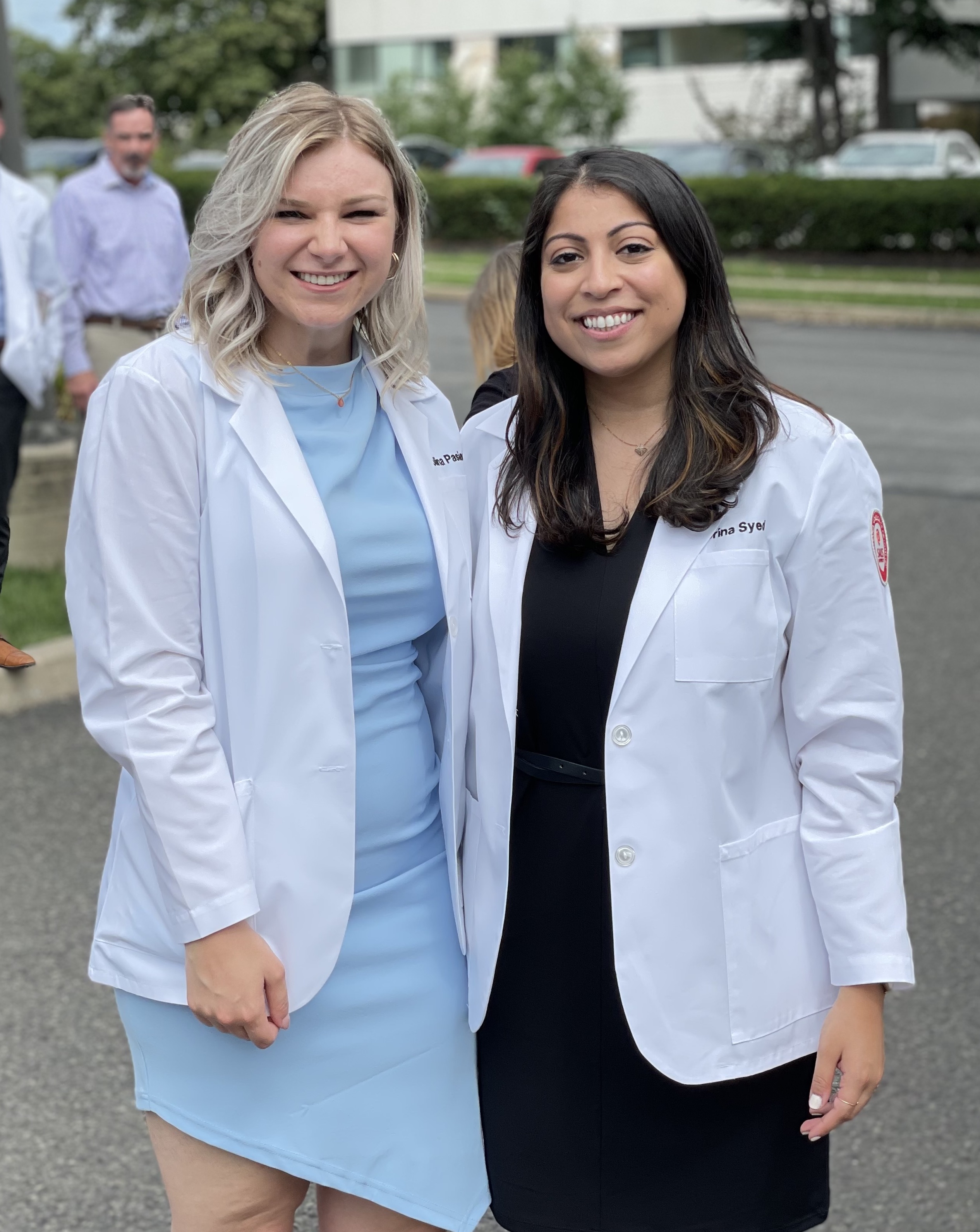 Karolina and Sabrina in white coats