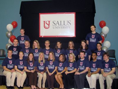 group photo of students wear salus shirts