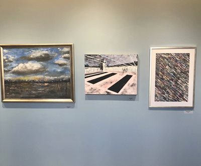 Three paintings from the art exhibit