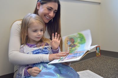 SLP student working with a pediatric client