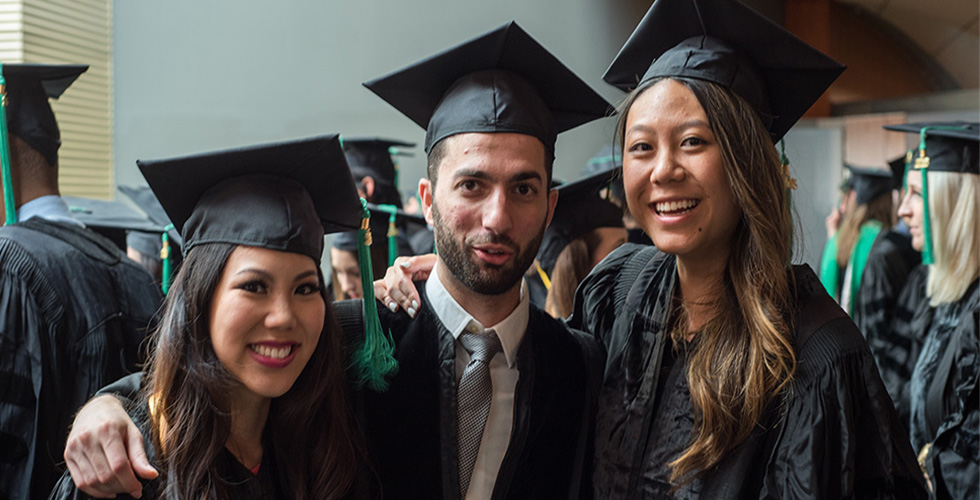 Three Students at Commencement