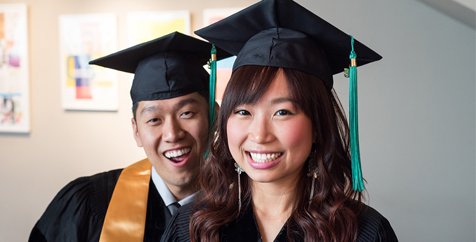 Two Students at Commencement