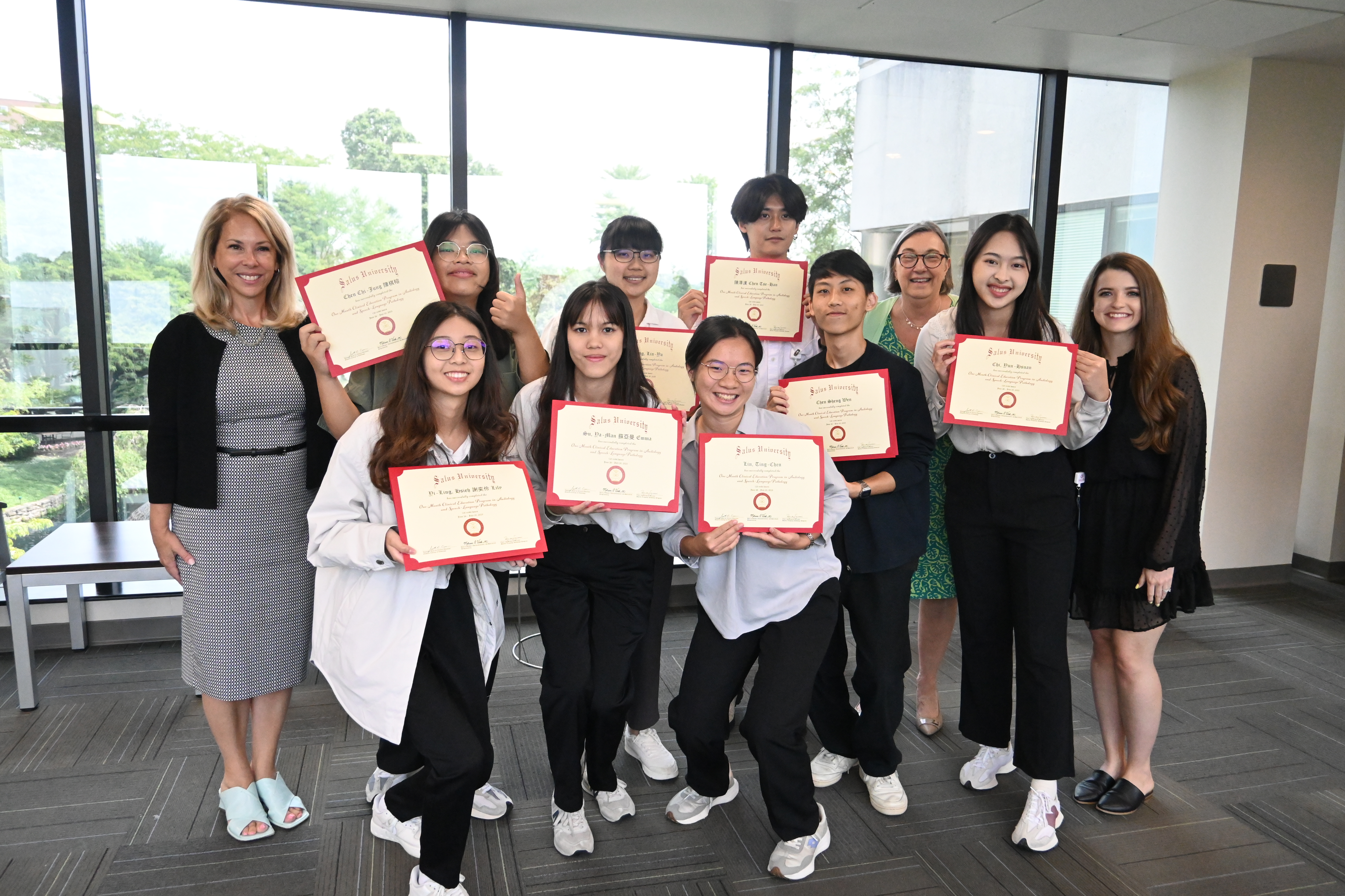 Drs. Owen and Vitek, Sarah Tinkoff, and Taiwan students