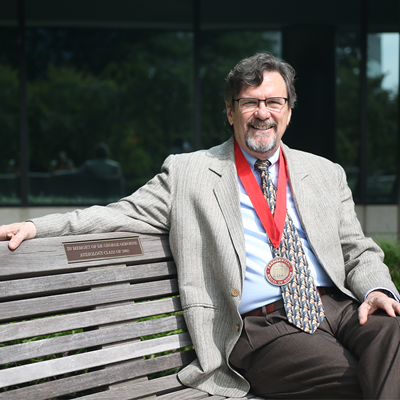 Victor Bray sitting on EP campus bench