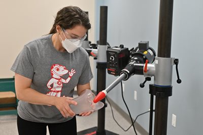 Virginia Muthard making a prosthesis