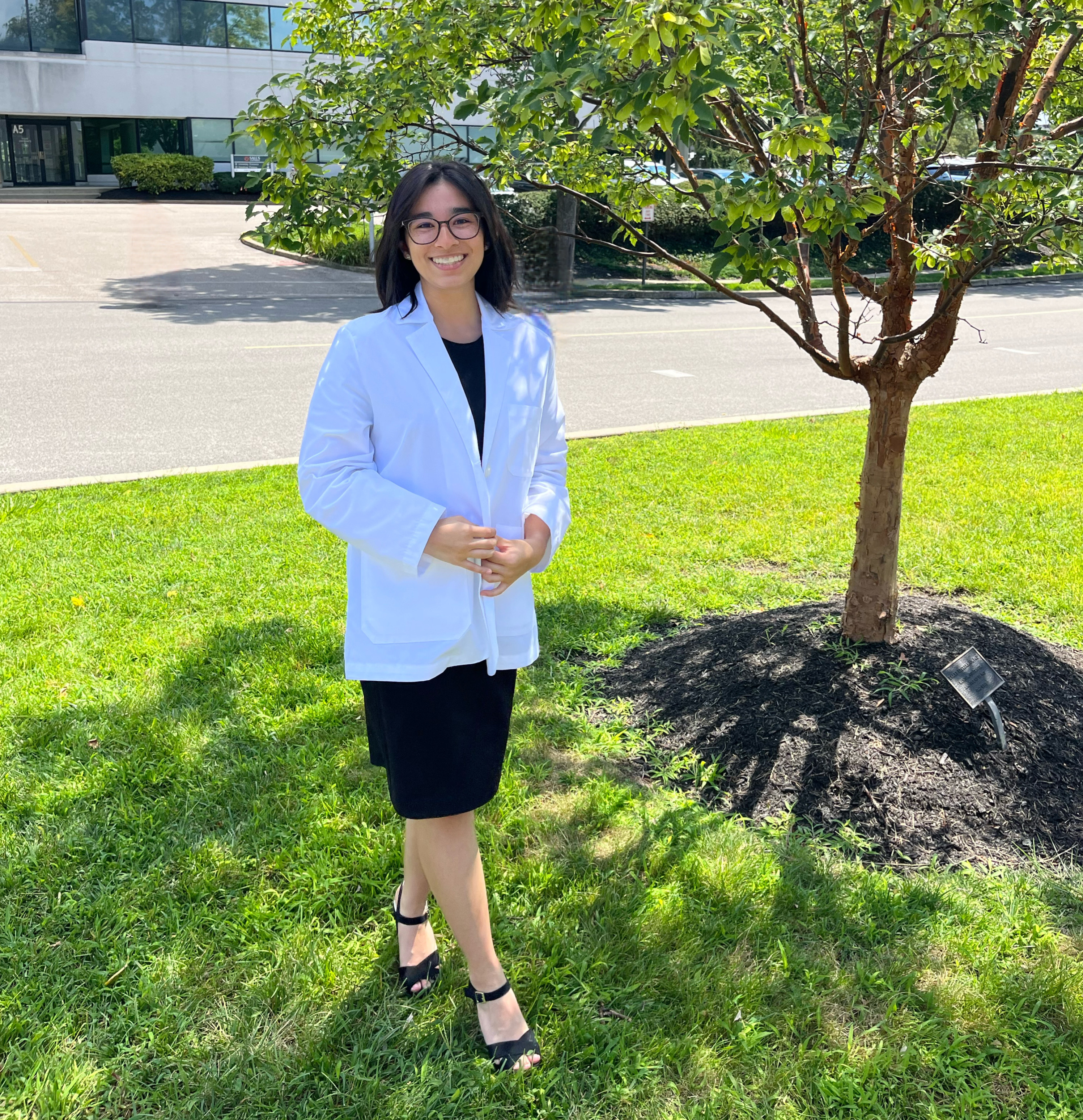 Helen Laguerta wearing her white coat