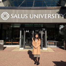 Ariella outside the Salus main entrance