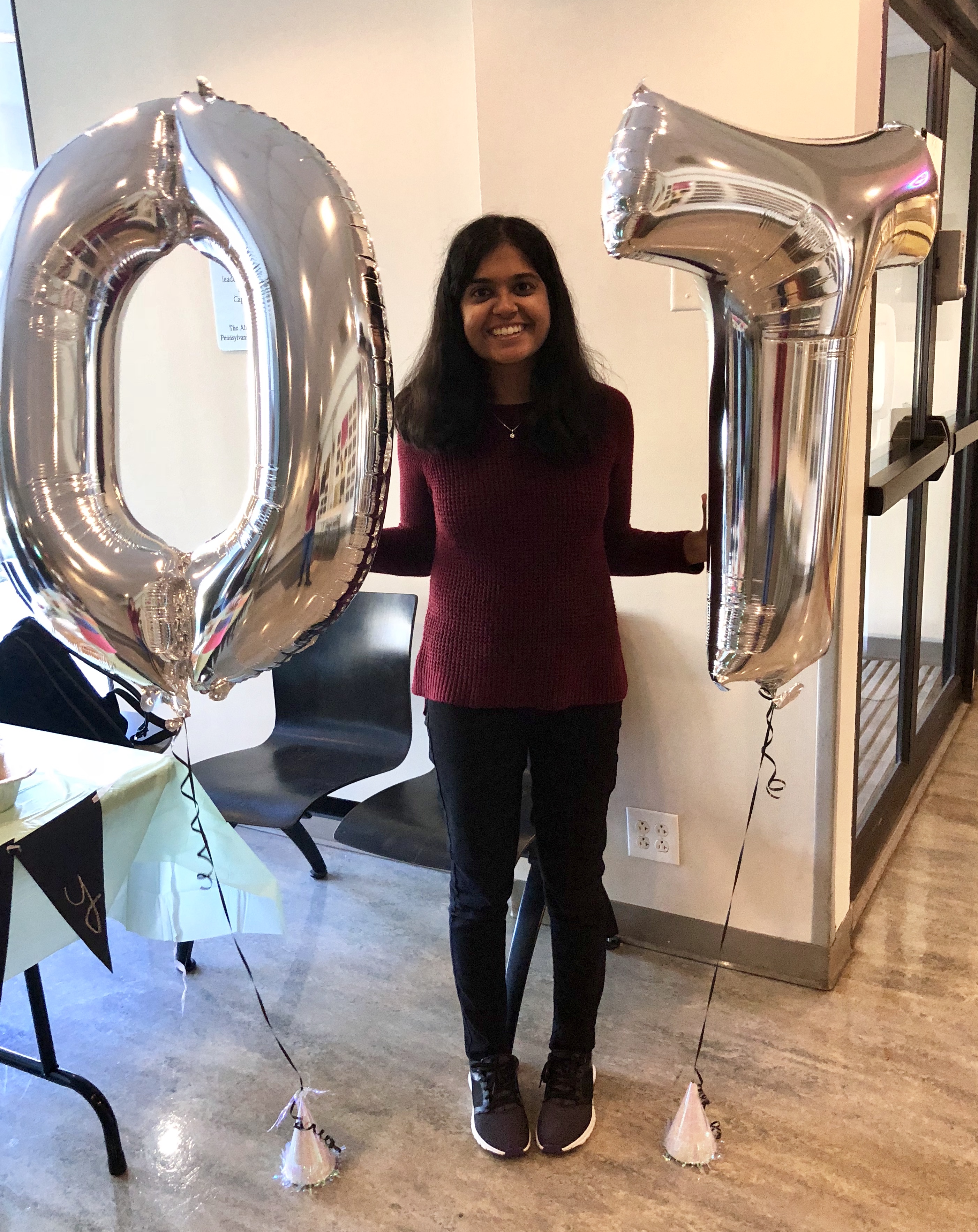 Mauli holding OT balloons