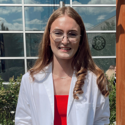 Emily in her white coat