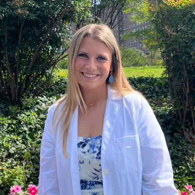 Emily in her white coat