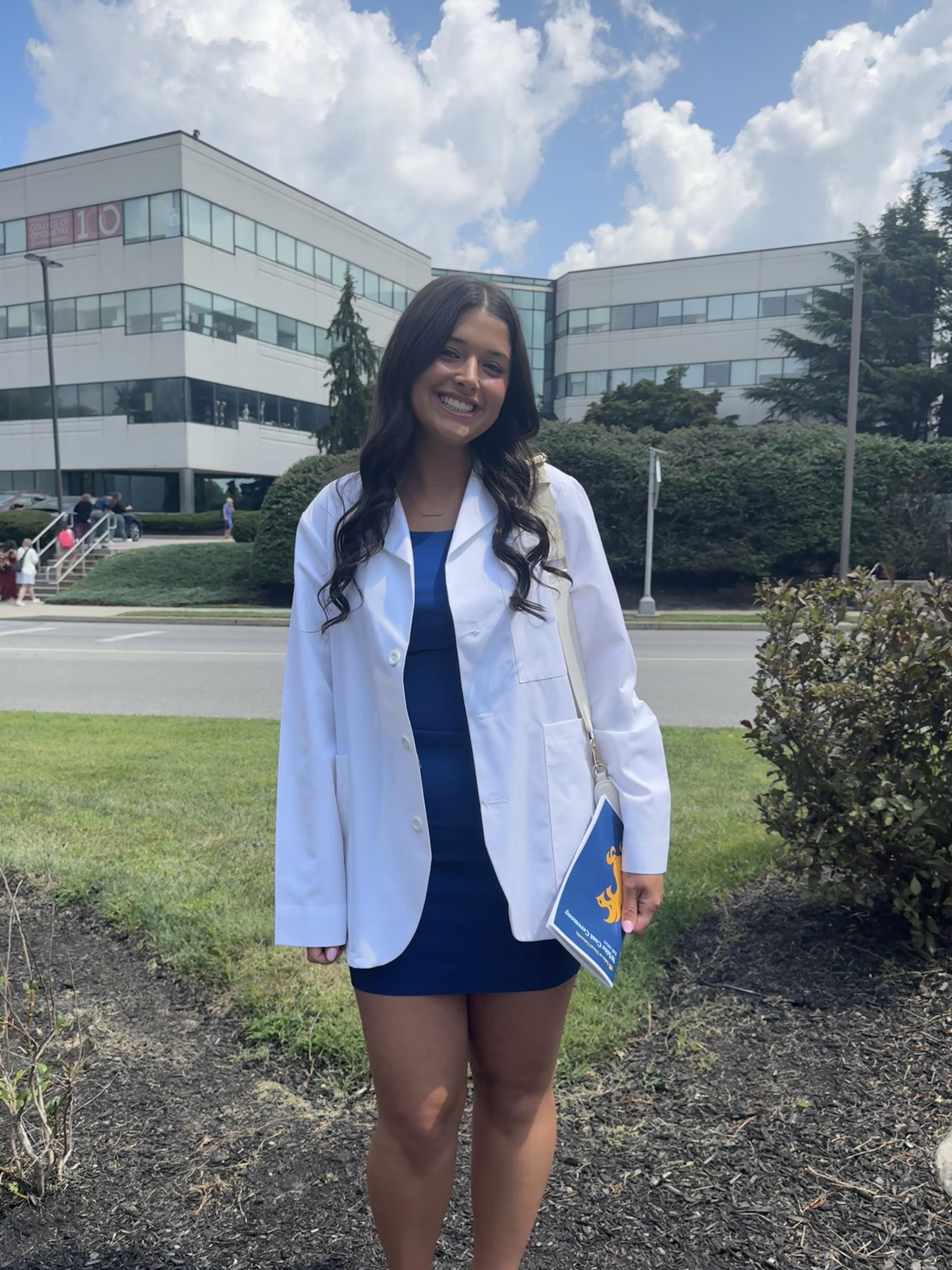 Jenna in her white coat