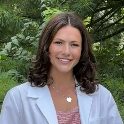 Gabrielle in her white coat