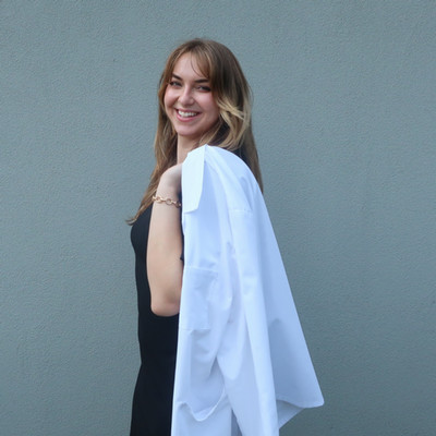 Alana with her white coat