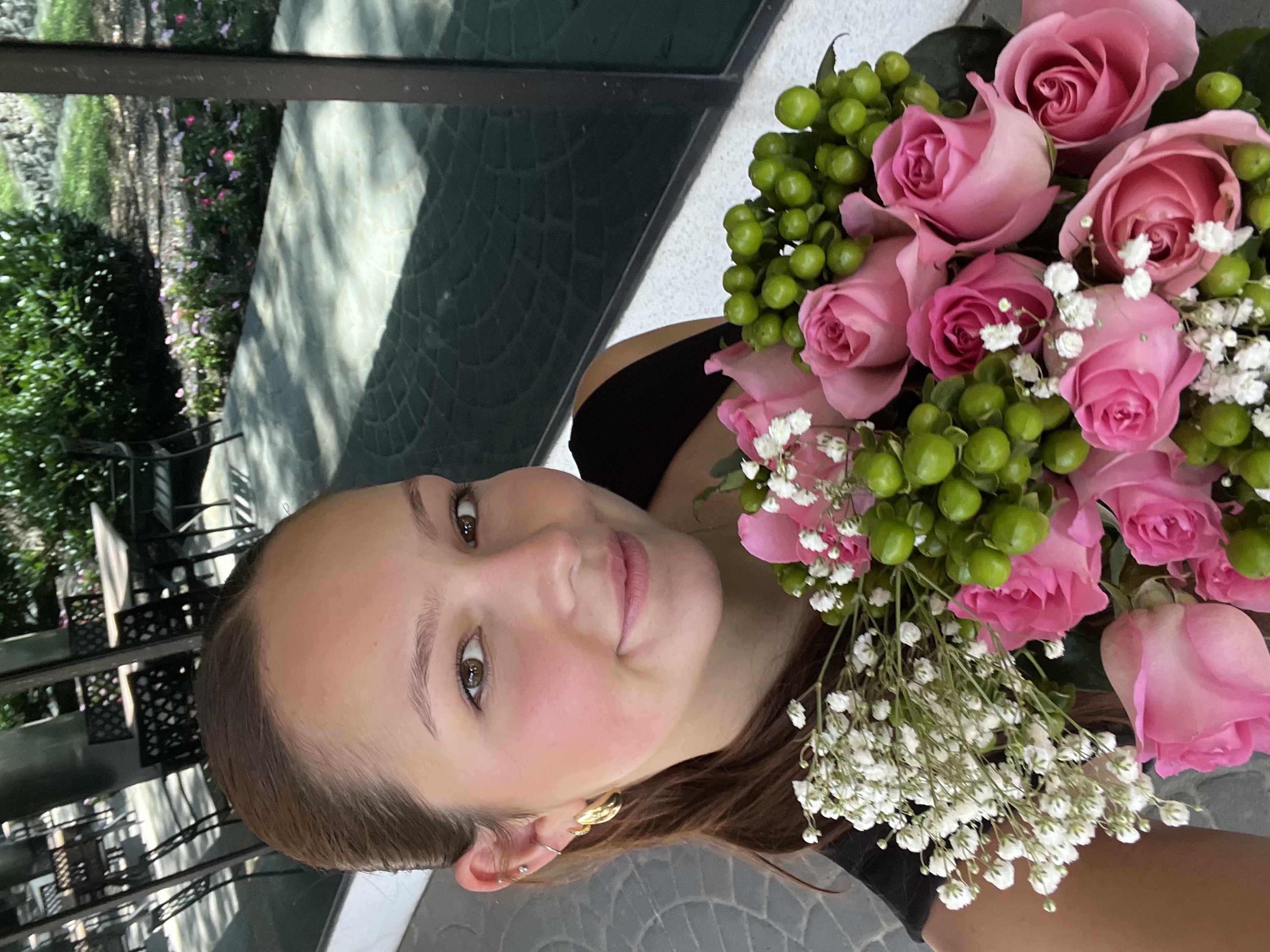 Julia holding flowers