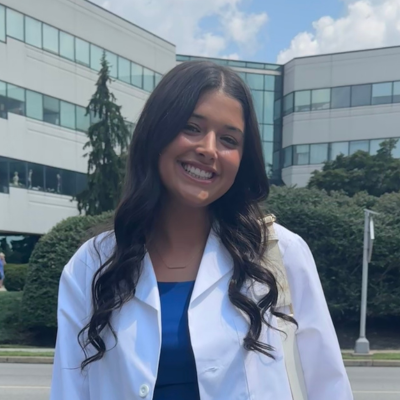 Jenna wearing her white coat