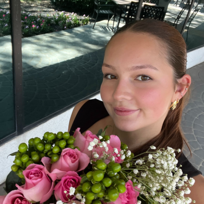 Julia holding flowers