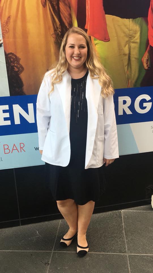 Kristin in her white coat