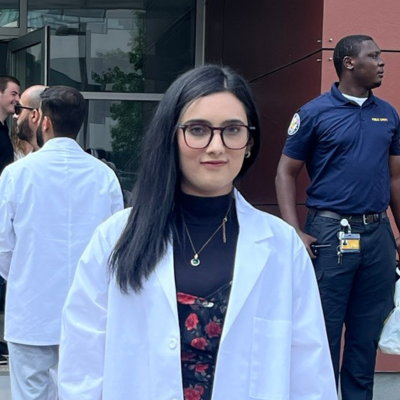 Maria in her white coat