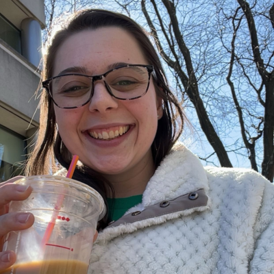 Rebecca holding coffee