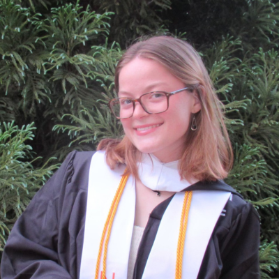 Riley wearing her graduation gown
