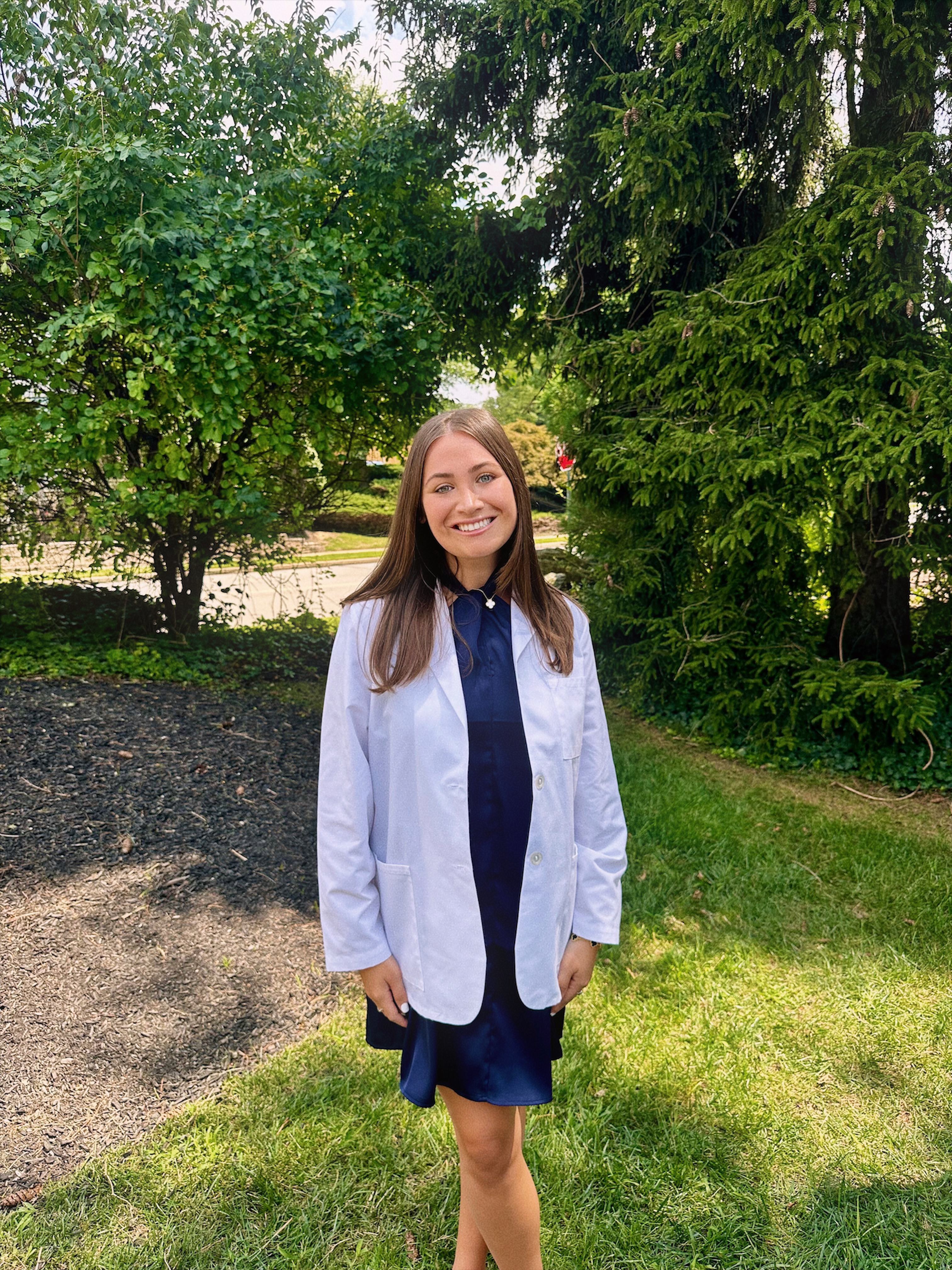 Lauren in her white coat