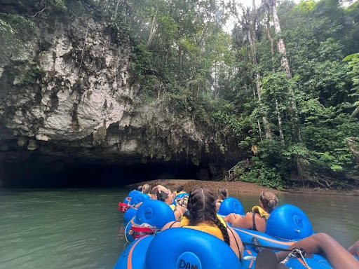 students tubing in Belize