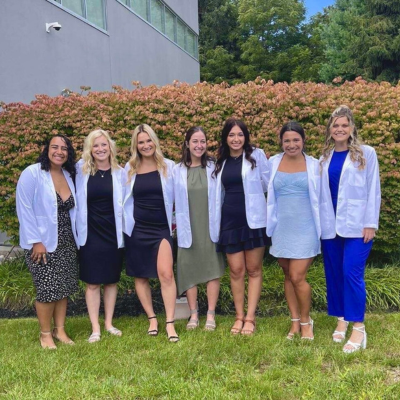 OT students in white coats