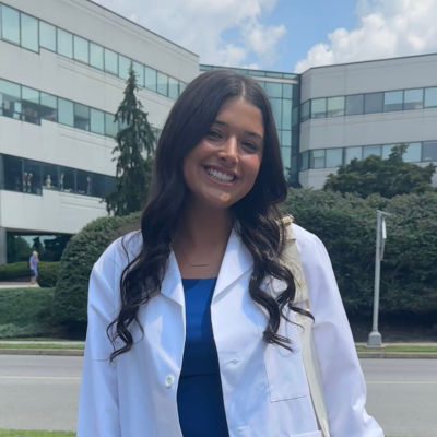 Jenna in her white coat